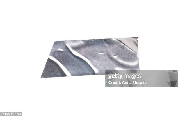 festive silver metallic wrinkled adhesive tape. festive design element for multiple types of graphic design decorations. isolated on white background, cut out. textured, high resolution - autocollant photos et images de collection