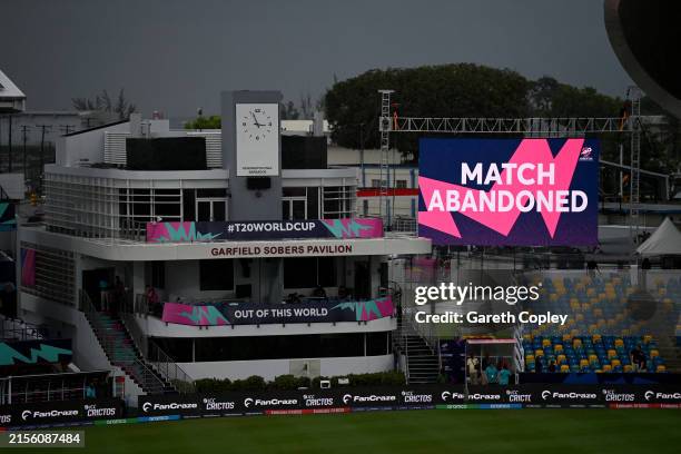 The scoreboard displays after the match is abandoned during the ICC Men's T20 Cricket World Cup West Indies & USA 2024 match between England and...