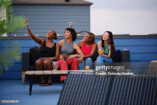solar energy - summer rooftop gathering - rooftop deck stock pictures, royalty-free photos & images