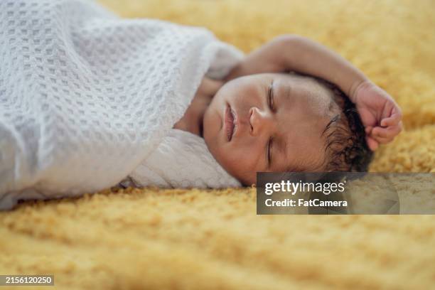 sleeping baby - baby blanket stock pictures, royalty-free photos & images