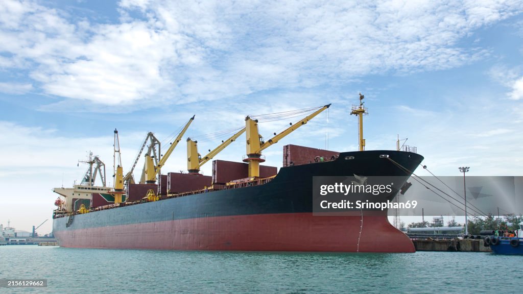 Container ship at main port It represents the backbone of shipping and the important role the maritime industry plays in global trade and logistics.