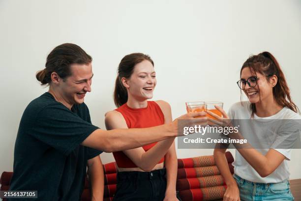tourists or backpacker get welcome drink while come to check into a hostel reception. tourism and hotel business concept. - bunkbed stock pictures, royalty-free photos & images