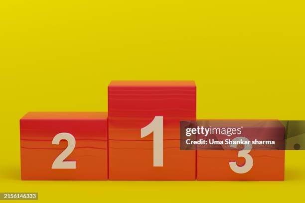 winners podium against yellow background. - third place stock pictures, royalty-free photos & images
