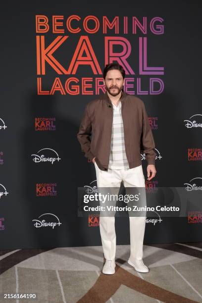 Daniel Brühl attends a photocall for the movie "Becoming Karl Lagerfeld" on June 05, 2024 in Milan, Italy.