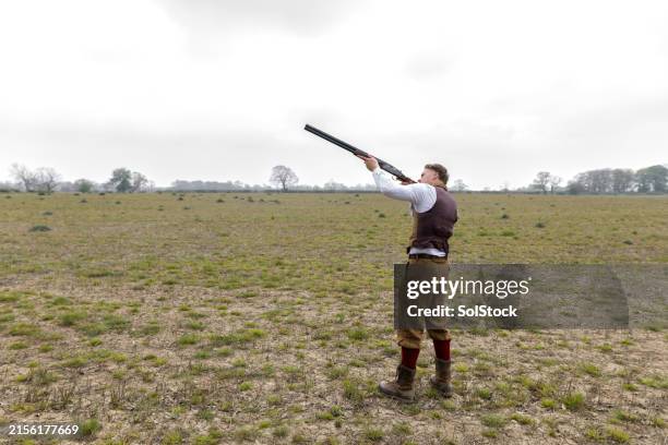 aiming to shoot - hitting stock pictures, royalty-free photos & images