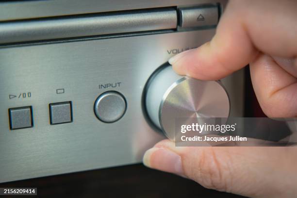turning up the volume - radio controller stock pictures, royalty-free photos & images