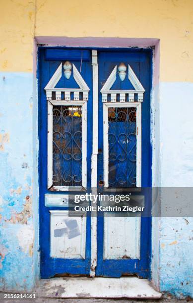 blue and white painted door, tangier, morocco - tangier stock pictures, royalty-free photos & images