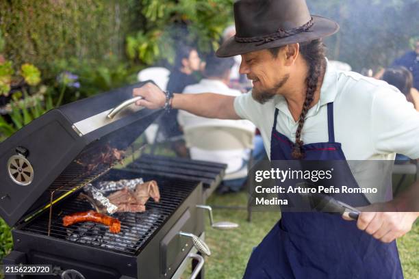 man likes to be an grill expert - ribeye steak on grill stock pictures, royalty-free photos & images