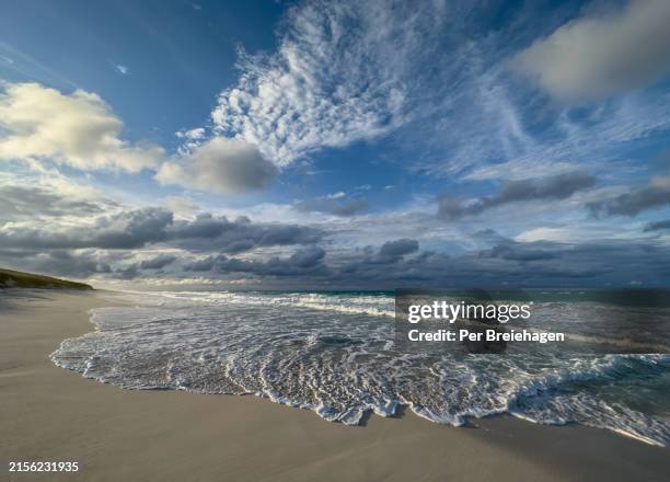 stocking island, exuma beach sunset wave, bahamas - exuma stock pictures, royalty-free photos & images