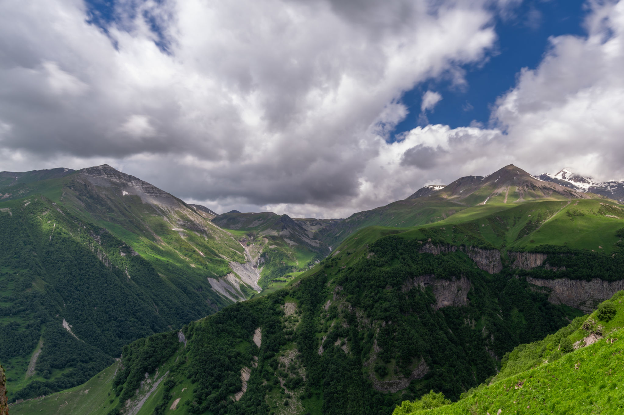 Panoramic View of a Valley with Caucasus Mountains Panoramic View of a Valley with Caucasus Mountains