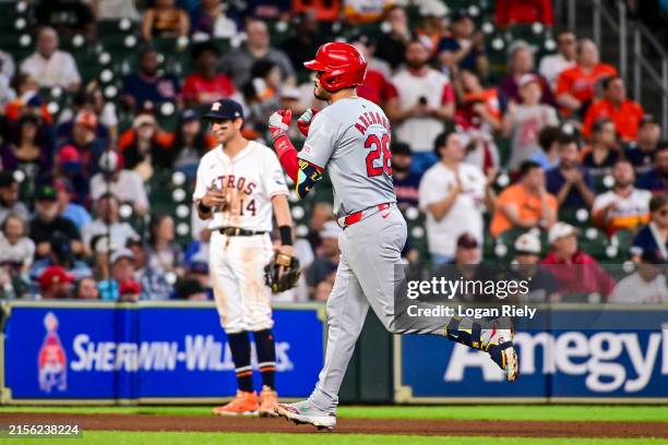 Nolan Arenado of the St. Louis Cardinals celebrates after hitting a solo home run in the sixth inning against the Houston Astros at Minute Maid Park...