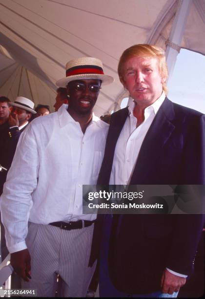 Sean "Diddy" Combs and Donald Trump attend the 1998 Mercedes Benz Polo Challenge at the Bridgehampton Polo Club in Bridgehampton, New York on August...