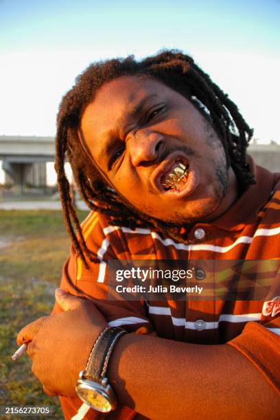 Ported Bag Rapper 391 Rapper Teeth Stock Photos, High-Res Pictures, and Images - Getty Images