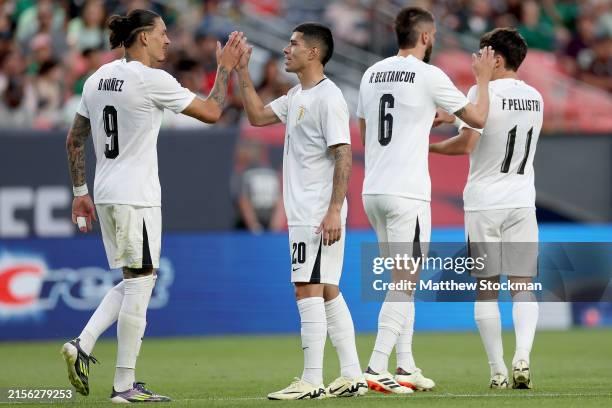 Darwin Gabriel Nenez of Uruguay celebrates with Lucas Rene Olaza after scoring against Mexico in the second half during an international friendly...