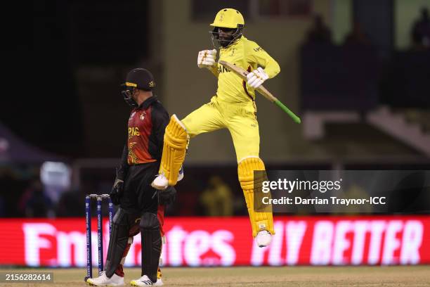 Kenneth Waiswa of Uganda celebrates victory for Uganda first ever ICC World Cup victory following the ICC Men's T20 Cricket World Cup West Indies &...