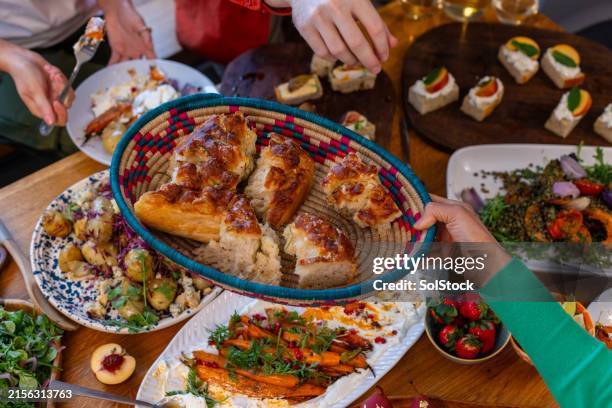 unrecognisable people having lunch - small dinner party stock pictures, royalty-free photos & images