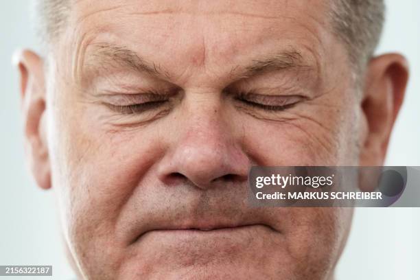 German Chancellor Olaf Scholz arrives to attend a meeting with the leadership of his social democratic SPD party at the SPD headquarters in Berlin on...