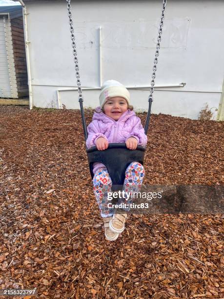 two year old girl lifestyle shoot - genomen met mobiel apparaat stockfoto's en -beelden