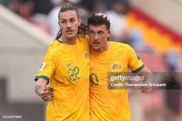 Ajdin Hrustic of Australia celebrates scoring his side's first goal with Jackson Irvine of Australia during the FIFA World Cup Asian second qualifier...
