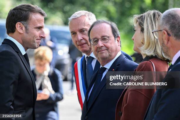 France's President Emmanuel Macron , flanked by the mayor of Tulle Bernard Combes , France's former President's wife, French actress Julie Gayet ,...