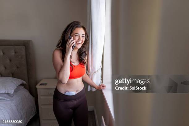 making a call to a friend - stomata stock pictures, royalty-free photos & images