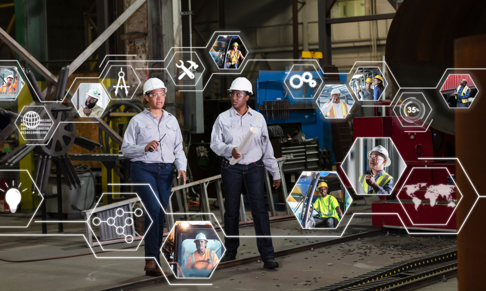 Two multiracial women engineers, global manufacturing Two multiracial women engineers, global manufacturing
