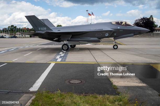 Lockheed Martin F-35 Lightning II multirole combat airplane of the United States Air Force rolls after a manoeuvre to a hanger at Ramstein Air Base...
