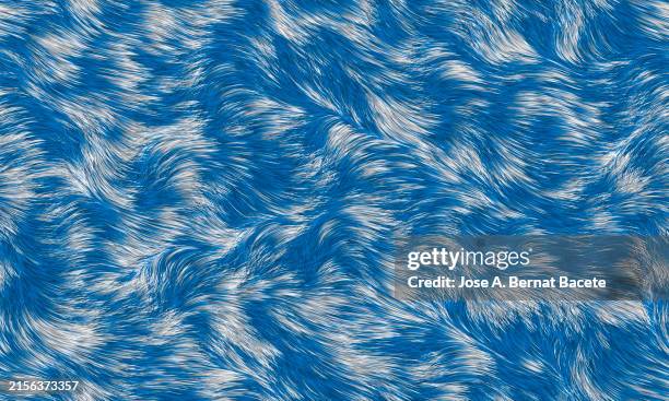 abstract background, long fiber textile fabric in blue and white tones with wavy movement. - pelliccia-materiale-tessile foto e immagini stock