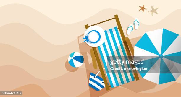 aerial view of summer beach with accessories and parasol - parasol stock illustrations