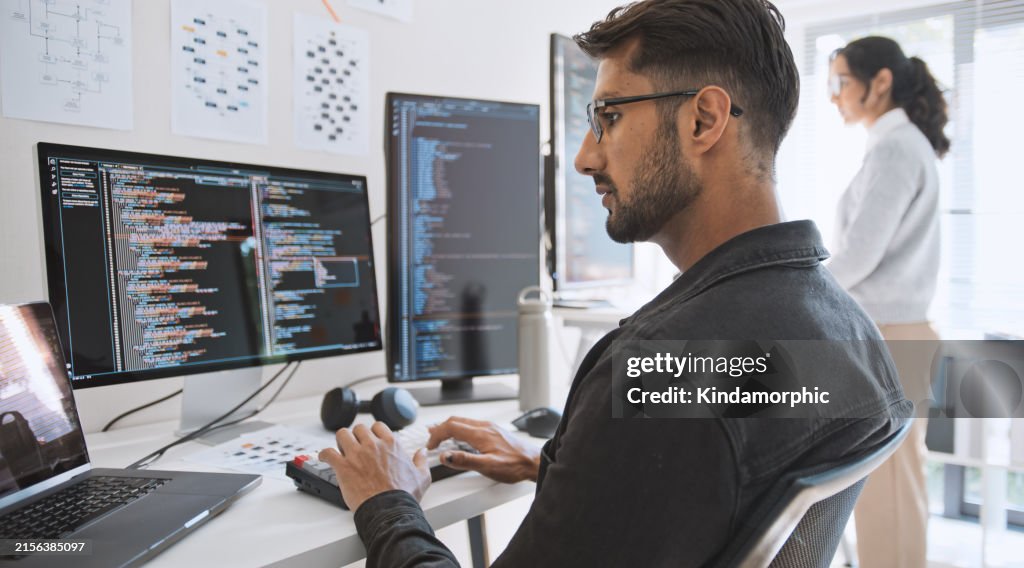 Hispanic Latin American couple, software engineer developer use computer, work on program coding together at home office. Programming language development technology, freelance job concept