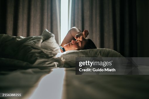 Woman awaking after sleeping well in a nice sleeping room. Woman awaking after sleeping well in a nice sleeping room.