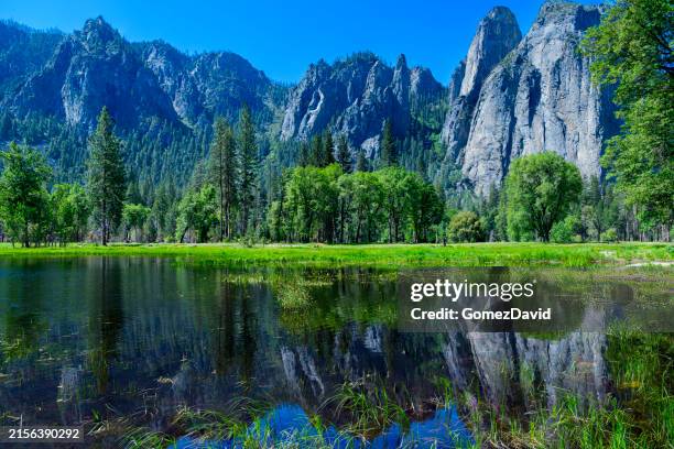 cathedral spires reflected in meadow pond - yosemite national park stock pictures, royalty-free photos & images