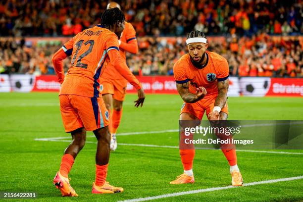 Memphis Depay of the Netherlands scores the disallowed goal but celebrates with Jeremie Frimpong of the Netherlands during the International Friendly...
