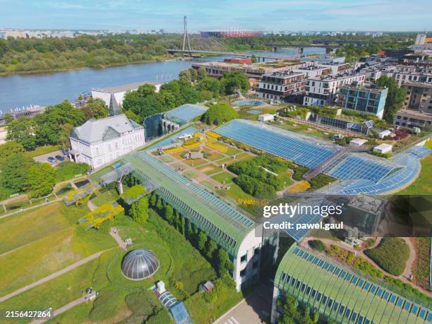 aerial view of university of warsaw library roof garden with vistula river, warsaw poland - warsaw stock pictures, royalty-free photos & images