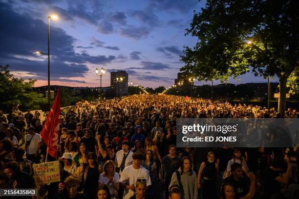 Activists and demonstrators take part in an 'antifascist rally' following the European election results, in Toulouse on June 10, 2024. President...