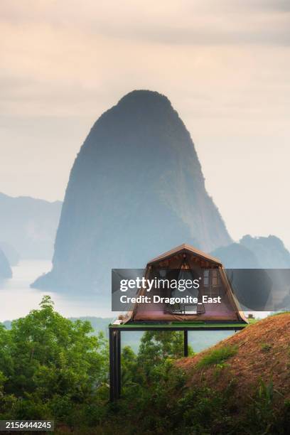 camping tent at samet nang she viewpoint with mountains in the andaman sea, phang nga, thailand. - phang nga bay stock pictures, royalty-free photos & images
