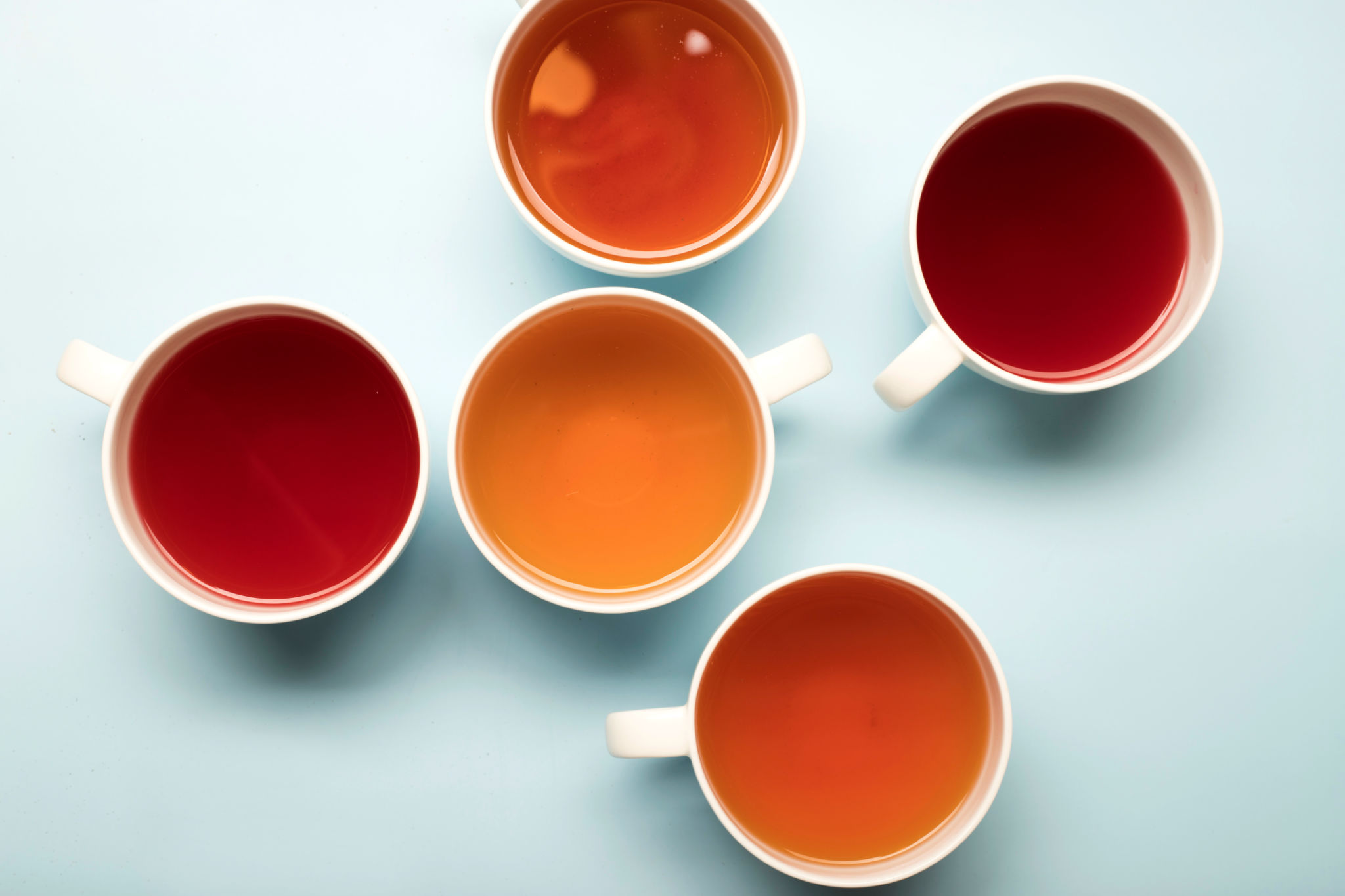 top view of colored tea cups top view of colored tea cups