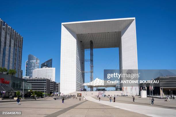 The Arche de la Defense or Grande Arche is an office building located in the La Defense business district to the west of Paris in the commune of...