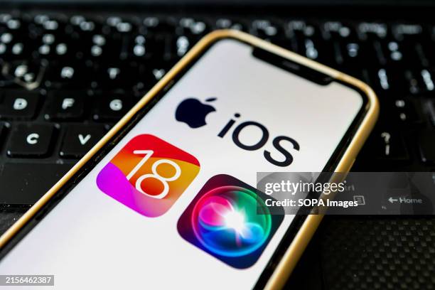 In this photo illustration, the Apple iOS 18 and Siri AI assistant logo seen displayed on an Apple iPhone. Beta release is expected at the Apple...
