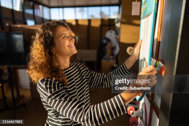 entrepreneurial spirit in retail - skateboard shop stock pictures, royalty-free photos & images