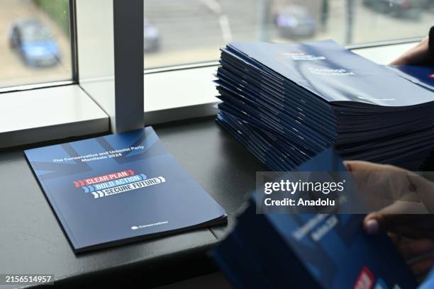 General view of the Conservative and Unionist Party Manifesto 2024 brochures as British Prime Minister and Conservative Party leader Rishi Sunak...