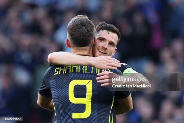 Andrew Robertson of Scotland celebrates with Lawrence Shankland of Scotland after he scores his team's second goal during the international friendly...