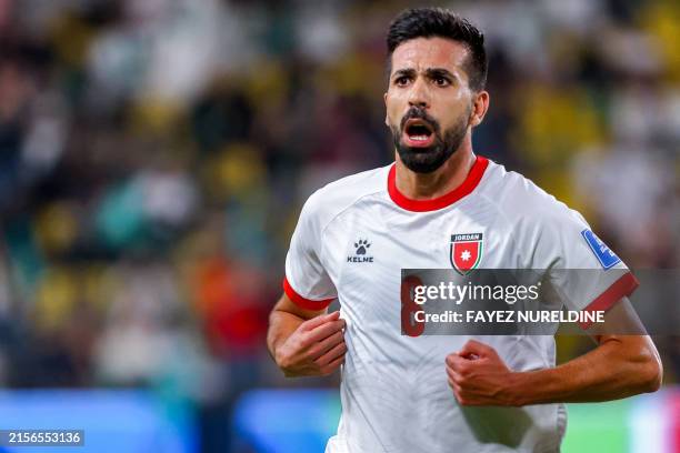 Jordan's midfielder Noor al-Rawabdeh celebrates after scoring his team's second goal during the 2026 FIFA World Cup AFC qualifiers football match...