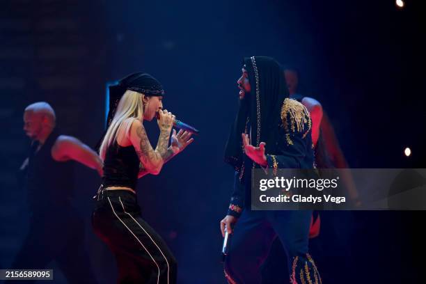 Bad Bunny performs live with Young Miko during his concert Most Wanted Tour at Coliseo de Puerto Rico José Miguel Agrelot on June 7, 2024 in San...