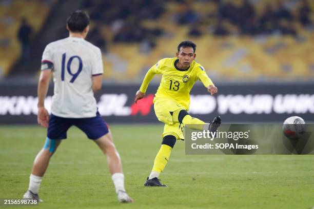 Muhammad Safwan Mazlan of Malaysia and Miguel Sandberg of Chinese Taipei in action during the 2026 World Cup/2027 Asian Cup Qualifiers Group D match...