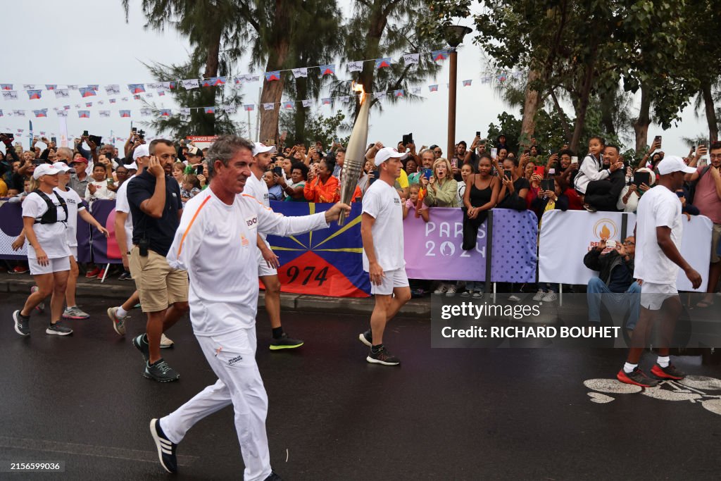FRANCE-OVERSEAS-REUNION-OLY-PARIS-2024-TORCH