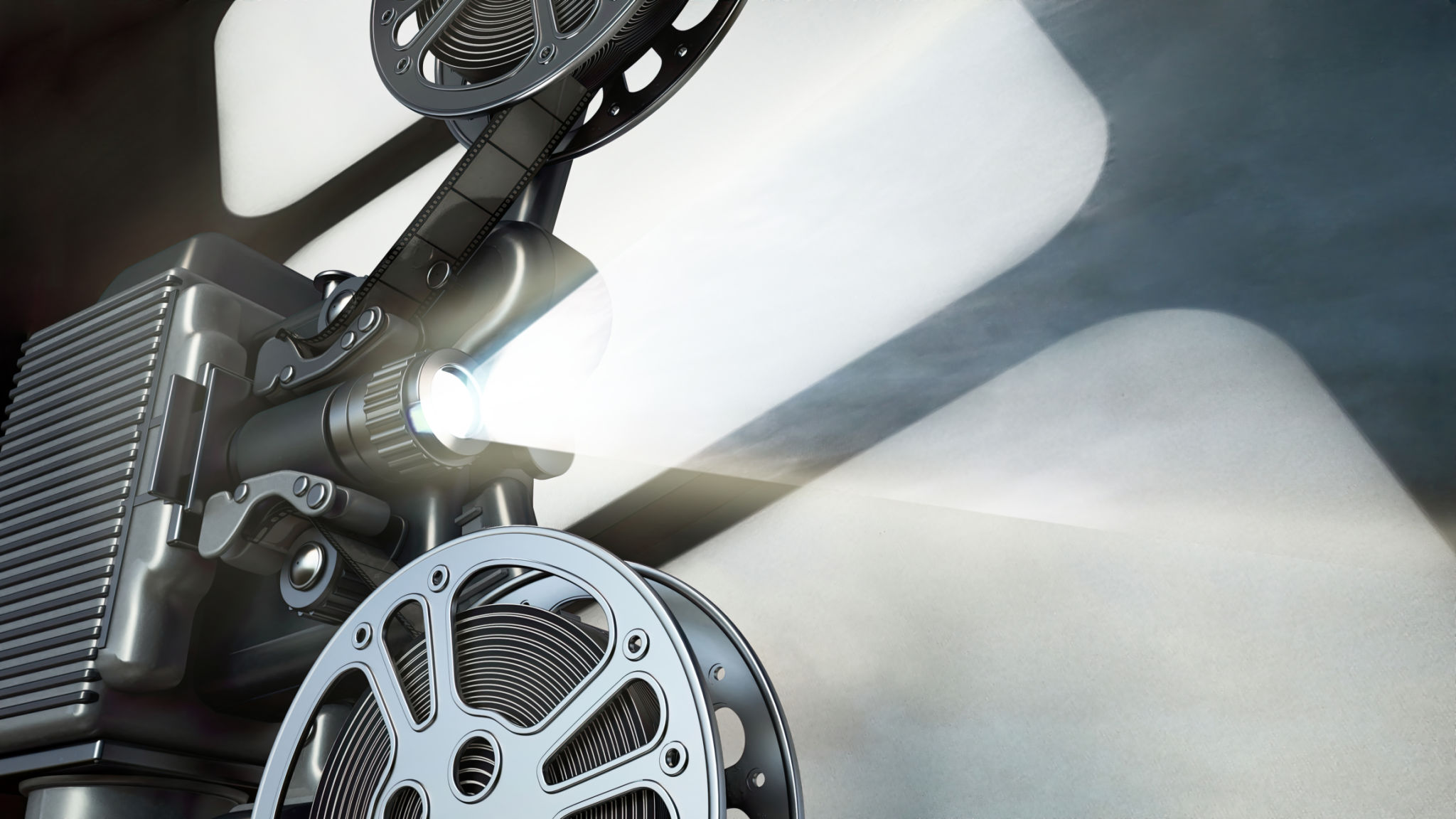 Gros plan d’un projecteur de film vintage avec un faisceau lumineux brillant Gros plan d’un projecteur de film vintage avec un faisceau lumineux brillant