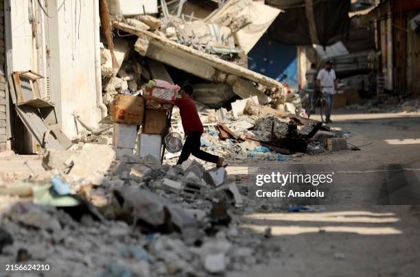 Children working in different professions are viewed on "World Day Against Child Labour" in Gaza City, Gaza on June 12, 2024. Palestinian children...