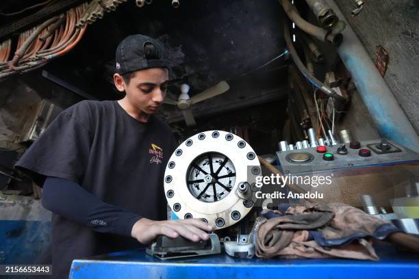 Children working in different professions, support their families by working in difficult jobs at industrial zones during the World Day Against Child...