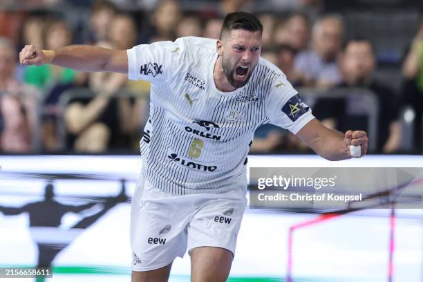 Harald Reinkind of Kiel celebrates a goal during the EHF Final4 Men Champions League second semifinal match between FC Barcelona and THW Kiel at...